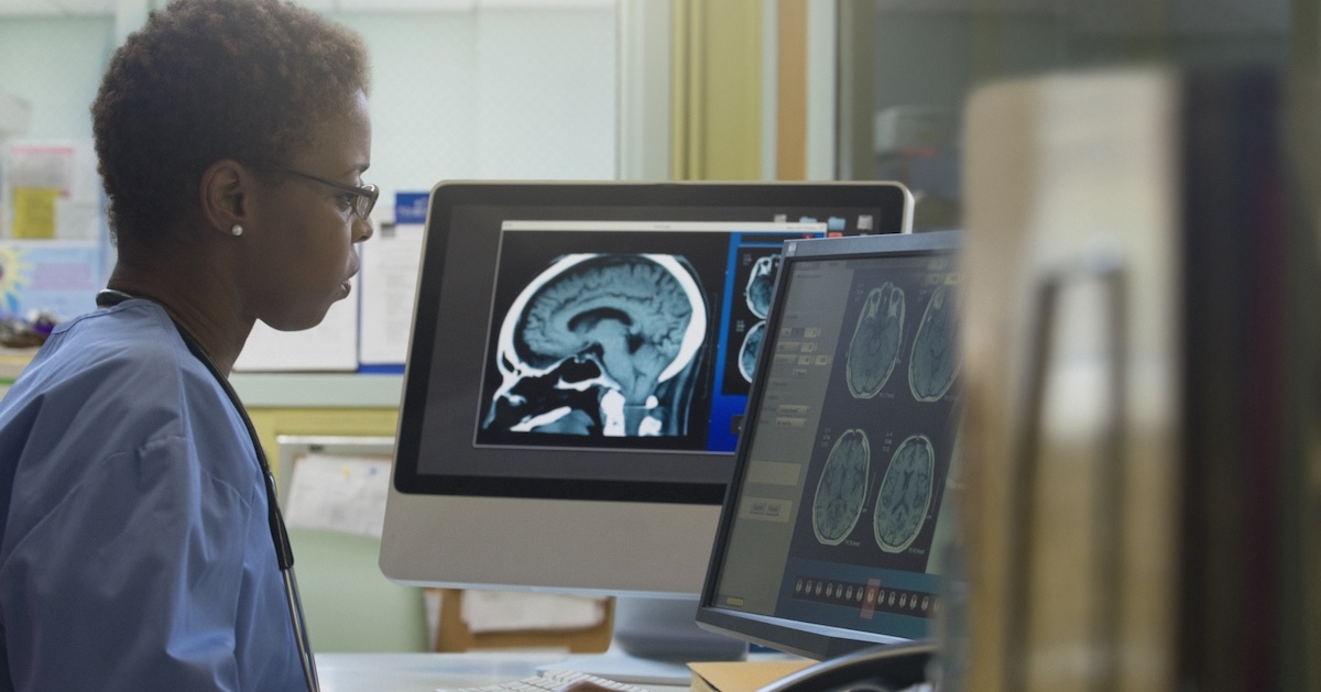 Doctor examining x-rays in hospital